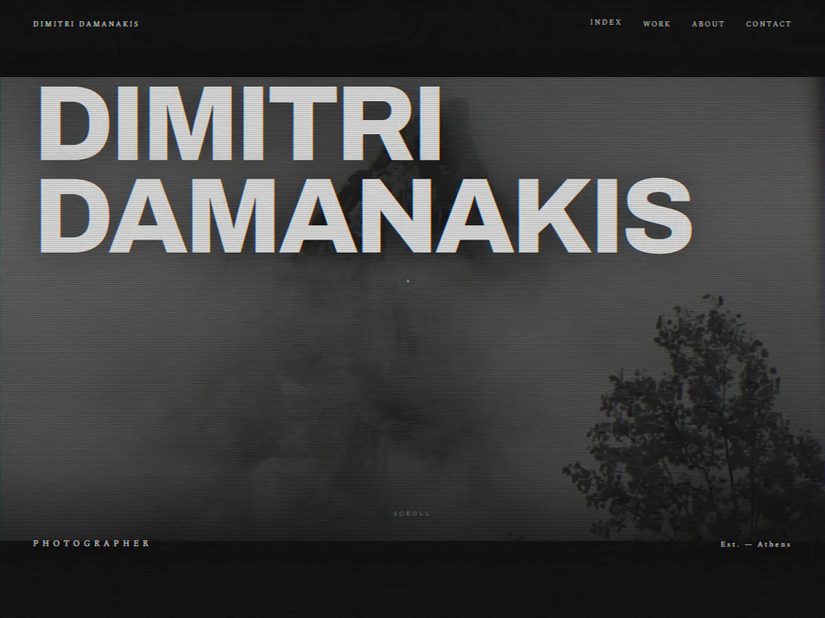 A photographer's portfolio home page, with the photographer's name set large over a landscape photograph.